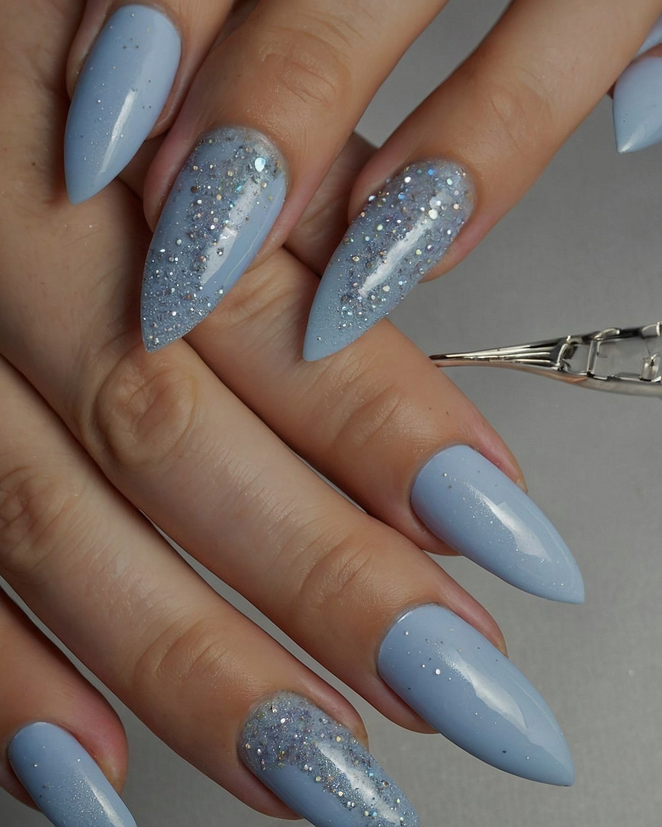Soft Pastel Blue with Subtle Sparkle Almond Tips