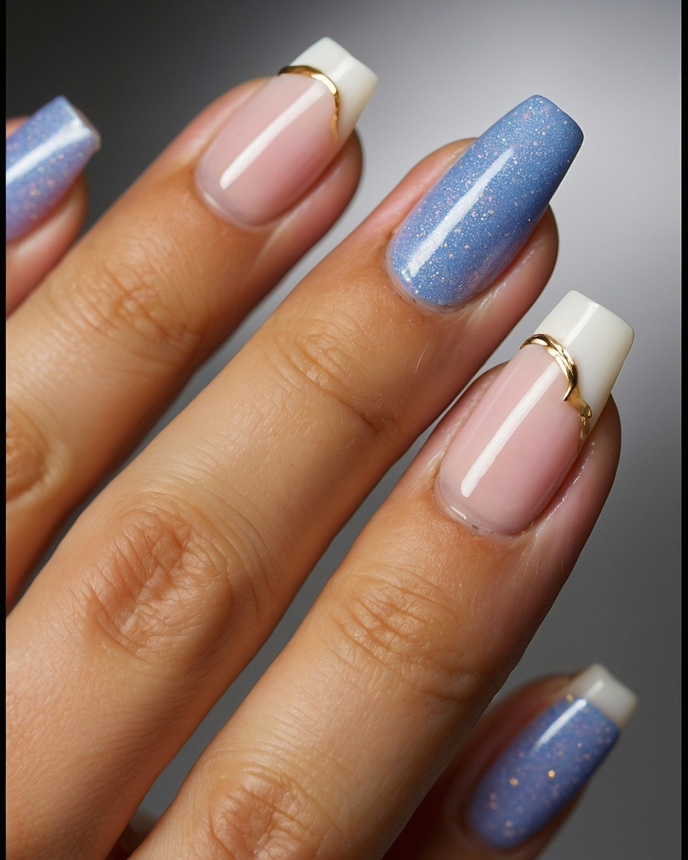 Subtle French Tips with a Golden Accent