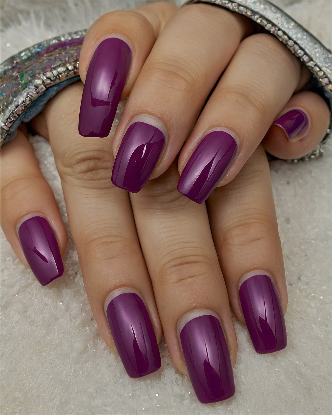 What makes these purple nails so captivating?