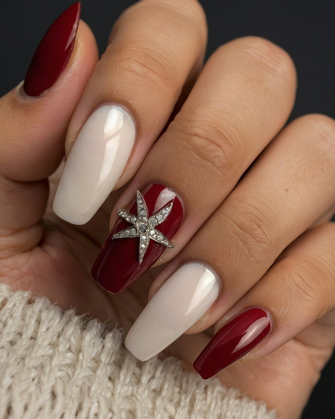 Deep Red and Cream Coffin Nails with Star Embellishment