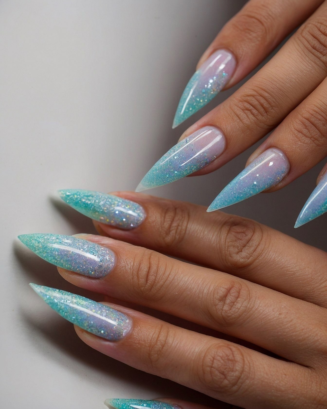 Sharp Stiletto Nails Meet Soft, Shimmering Gradient