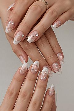Elegant Almond French Tips with Gold & Rhinestone Glamour