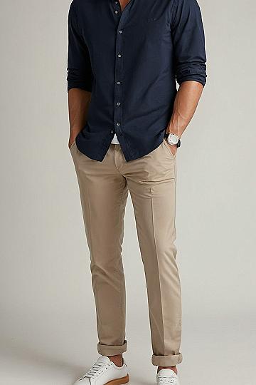 Pairing A Dark Shirt With Khaki Chinos And Clean White Sneakers