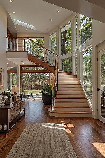 Designing a Grand Curved Staircase for Your Entryway