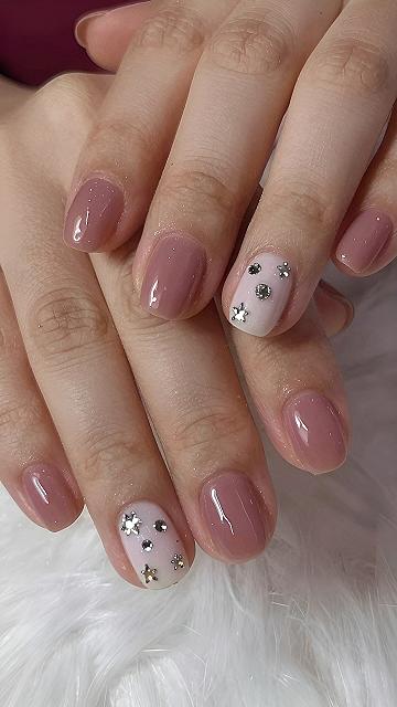 Adding Tiny Star Gems to Neutral Nails
