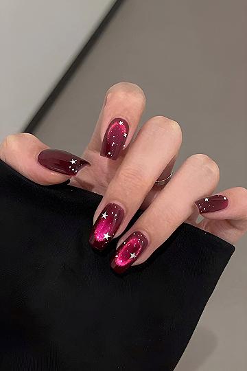 Understanding the Magic of Starry Burgundy Cat Eye Nails