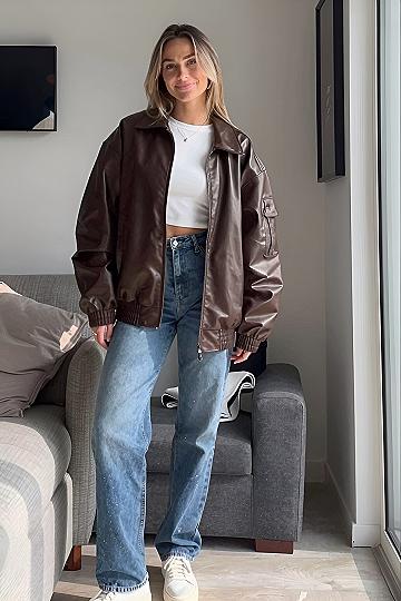 Pairing a Brown Bomber Jacket with Blue Jeans