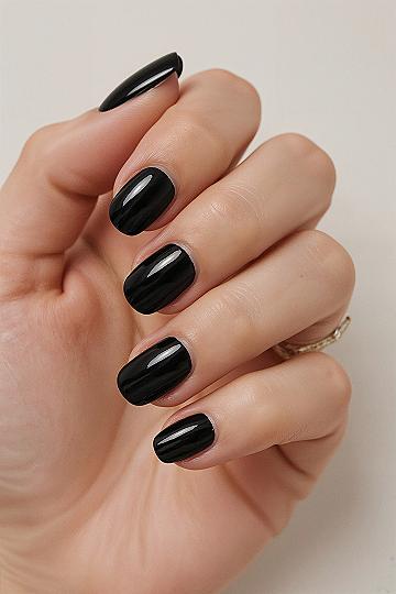 Elegant Dark Black Gel Nails: Glossy Short Round Designs