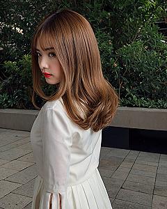 What makes this soft, layered cut so striking?