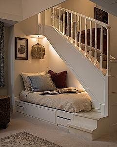 Utilizing Staircase Storage Beneath a Bedroom Loft Bed