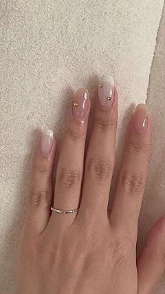 Adding Subtle Gold Studs to Short French Tip Nails