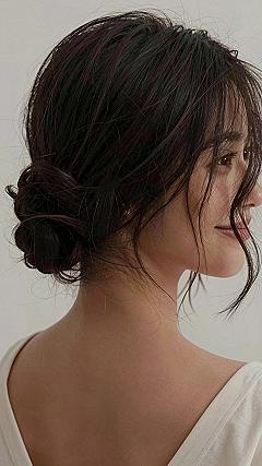 Creating a Soft Messy Side Bun for Modern Weddings