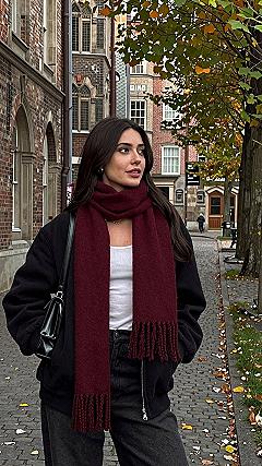 Adding a Deep Red Scarf to an Oversized Leather Jacket