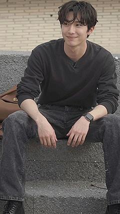 Layering an Oversized Leather Jacket with a Simple Crewneck