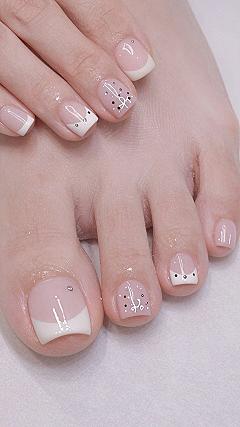 Adding Delicate Bow Details to Your Blush Pedicure