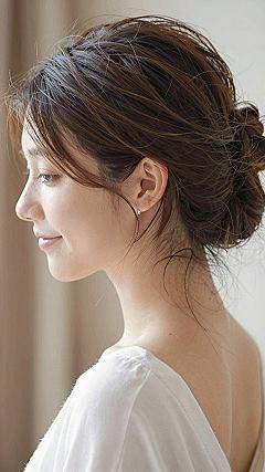Pinning Securely With A Wrapped Base Low Chignon