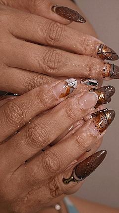 Applying Brown Tones and Metallic Details for Y2K Nails