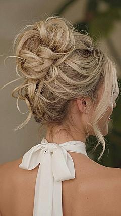 Keeping a Wispy Updo Secure Throughout the Evening