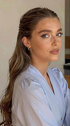 Slicked Back Crown With Subtle Waves And Small Hoops