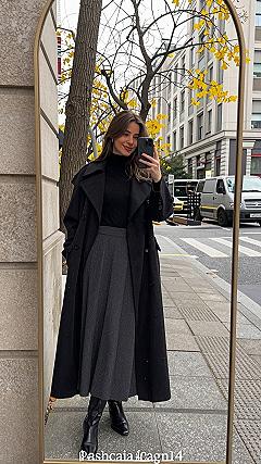 Layering a Long Leather Coat Over a Denim Midi Skirt