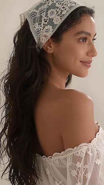 Styling a delicate lace headscarf for soft daily outfits