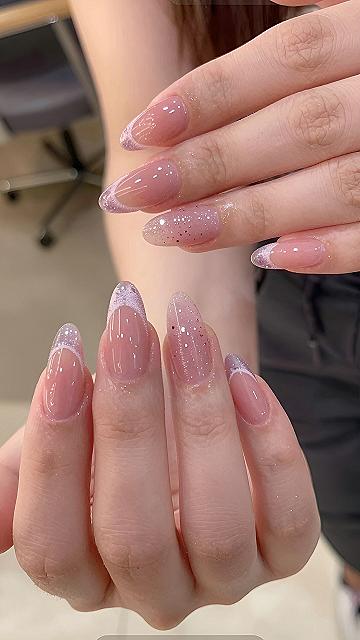 Glitter French Tips on Blush Pink Almond Nails