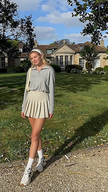 Styling a Soft Pullover with a Pleated Tennis Skirt