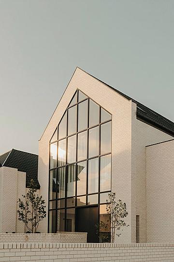Ultimate White Modern Exterior: Minimalist Brick & Black Accents