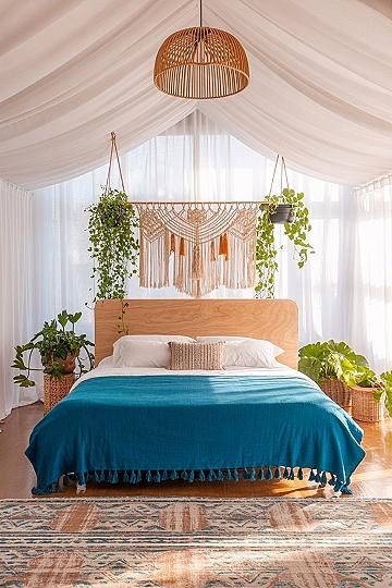 Boho Interior Vibes: King Bedding Meets Lush Greenery