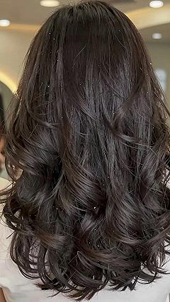 Rich Caramel Balayage on Dark Wavy Hair