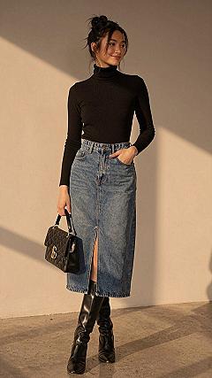Pairing a Black Turtleneck with a Structured Suede Skirt
