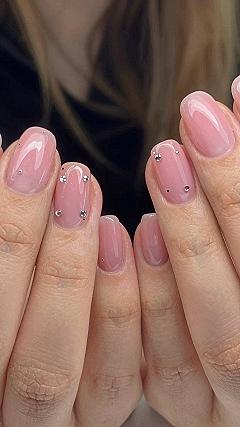 Maintaining Short Almond Nails with Polka Dots