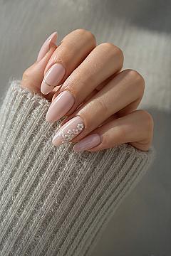 Spring Awakening: Delicate Pink Almond Nails with Floral Art