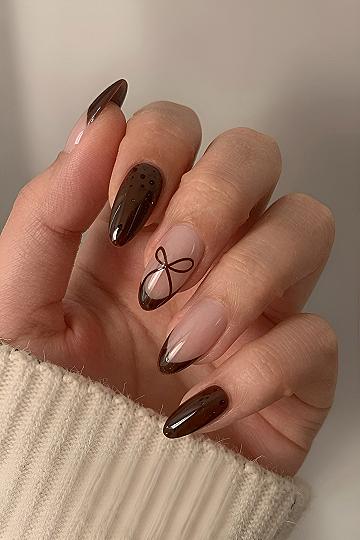 Rich Brown Almond Nails With Delicate Painted Bows