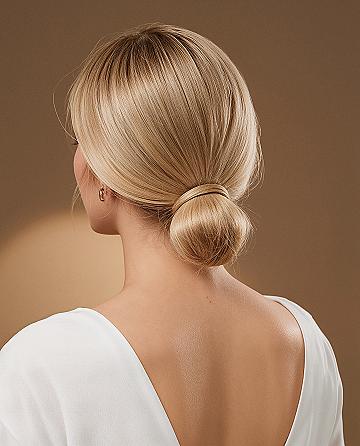Timeless Elegant Wedding Hairstyle: Classic Mid-Low Bun Perfection