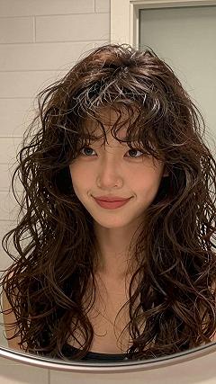 Curly Butterfly Cut with Piecey Fringe