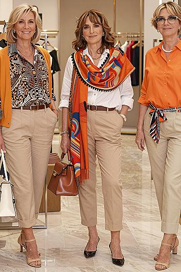 Pairing Bright Orange Tops With Neutral Khaki Trousers