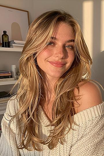 Understanding the Appeal of Long Layers and Soft Bangs