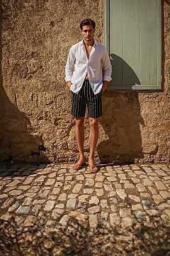 Effortless Vacation Style: White Linen & Striped Shorts for Men