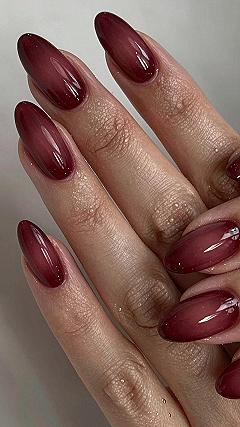 Maintaining Burgundy Cat Eye Aura Almond Nails