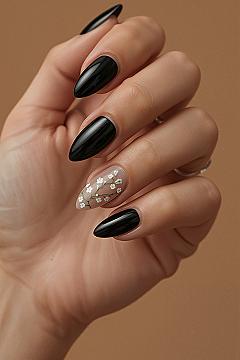 Chic Black Almond Nails with Delicate White Floral Accents