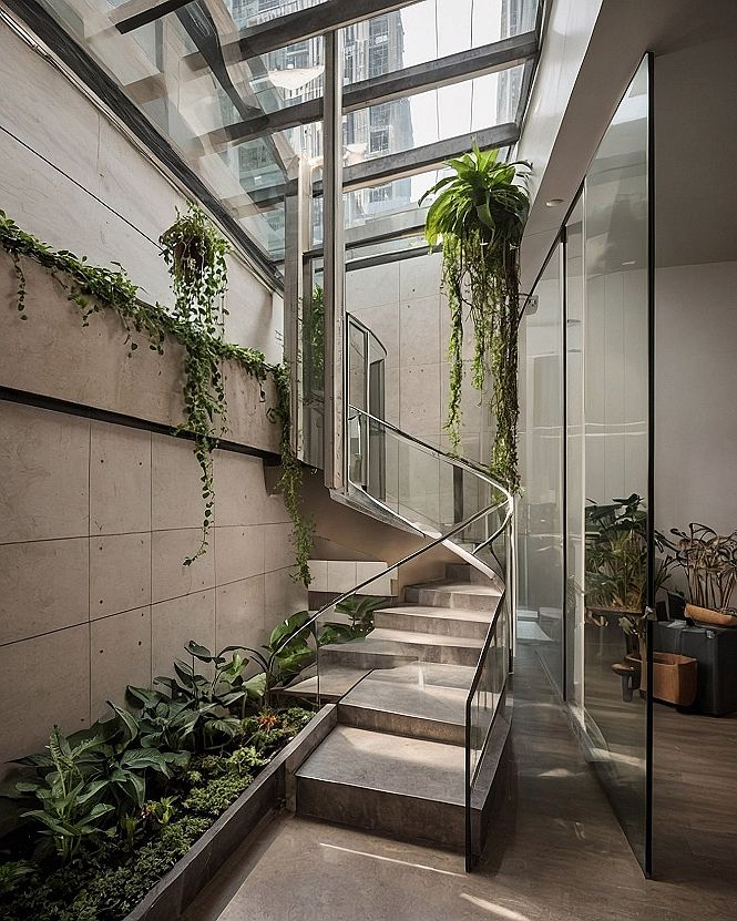 Modern Staircase with Lush Indoor Garden