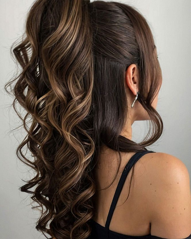 High Ponytail with Voluminous, Cascading Curls