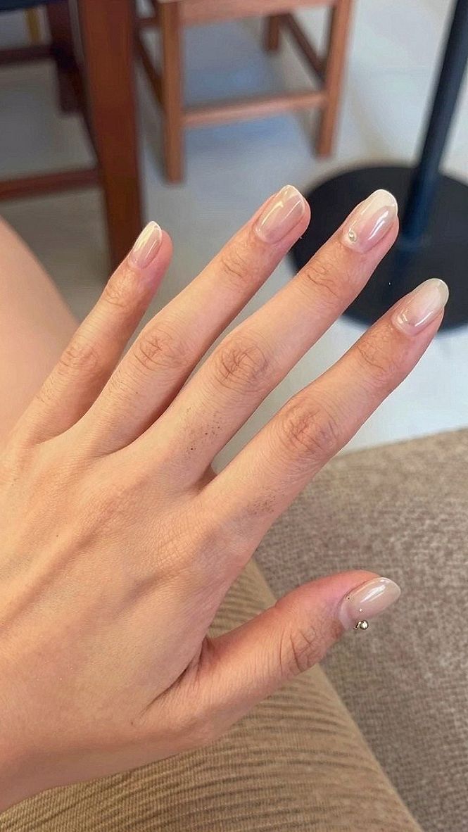 Why Minimalist Pearl Accents Suit Short Cream Nails