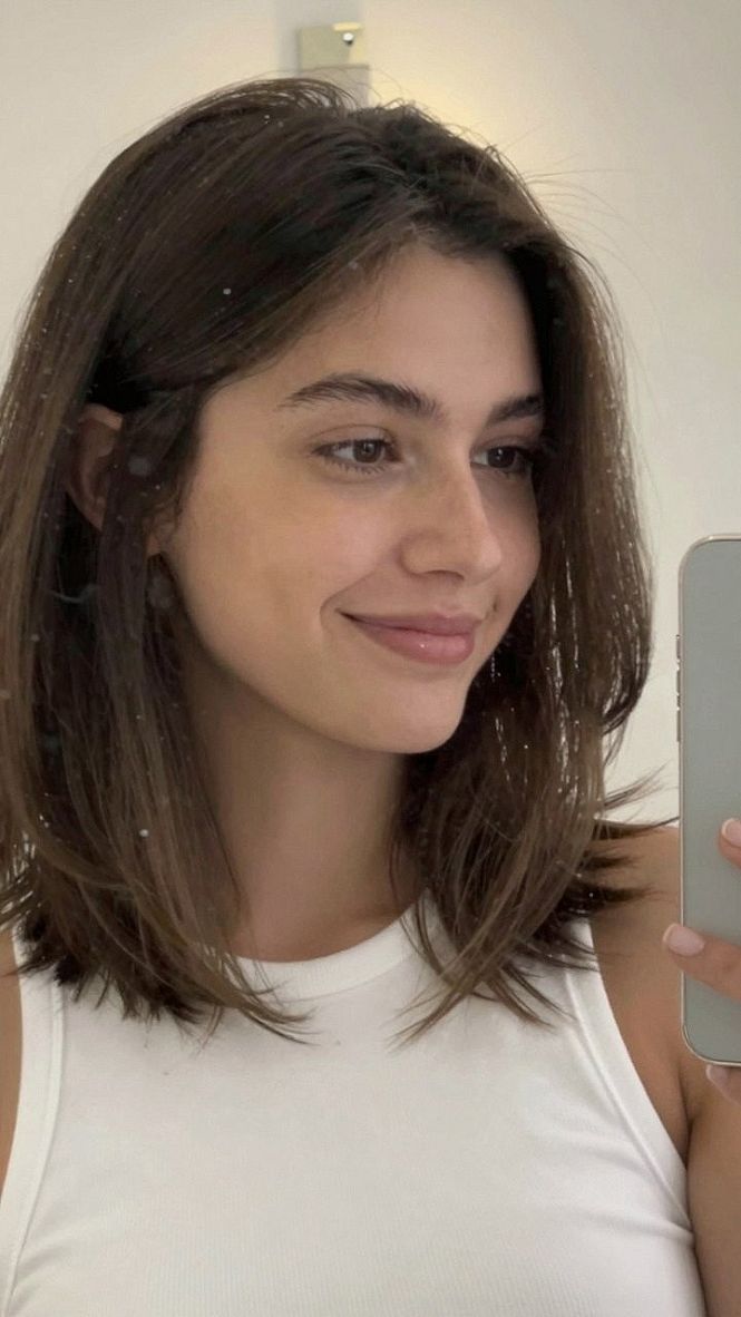 Sleek Collarbone Lob With Soft Layered Fringe