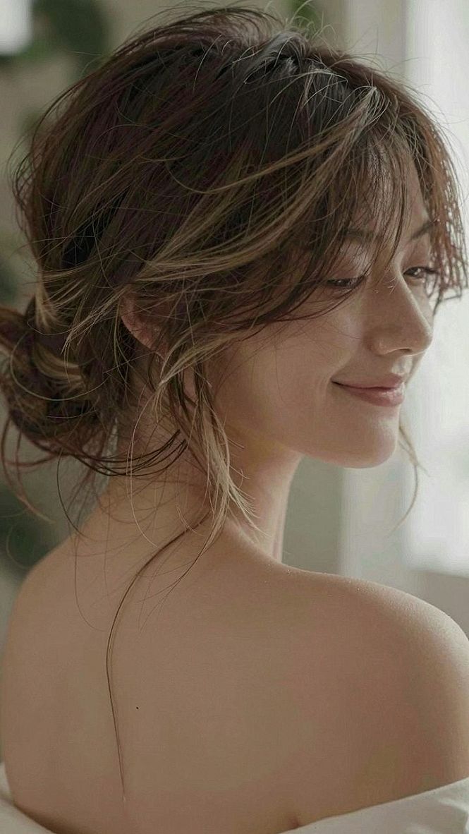Choosing a Messy Chignon with Loose Fringe