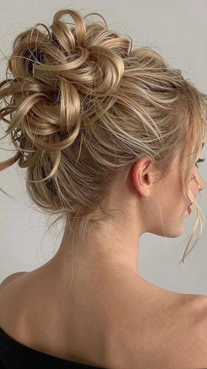 Textured High Updo With Loose Curls