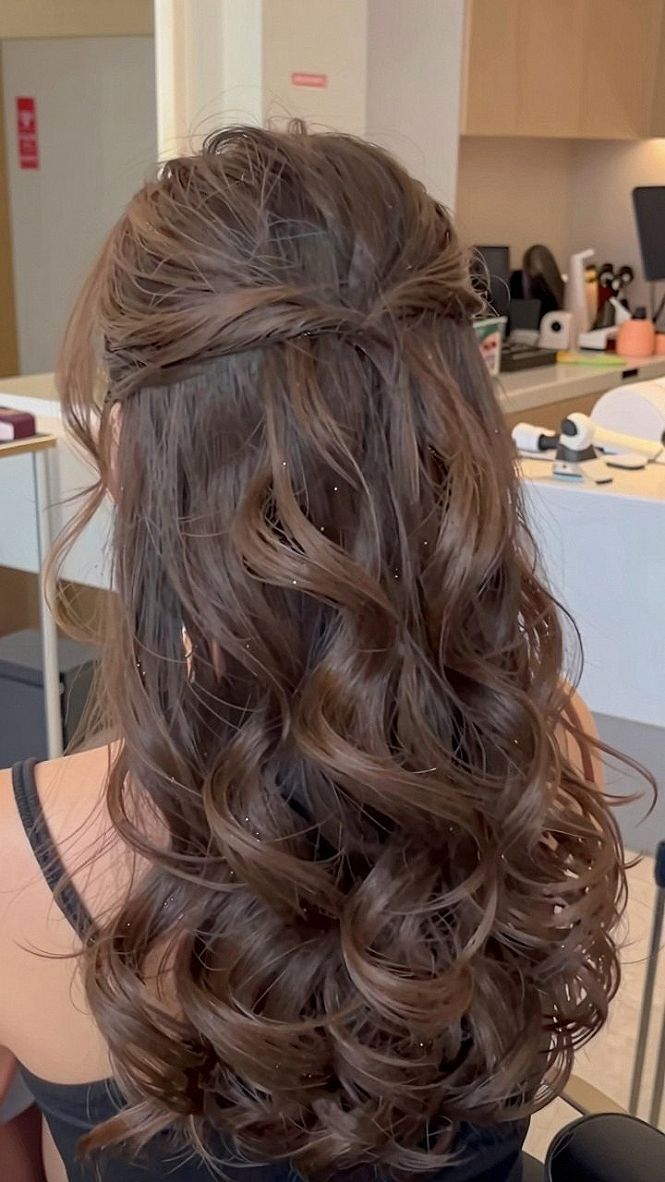 Creating a Soft Knotted Half Up Half Down Style