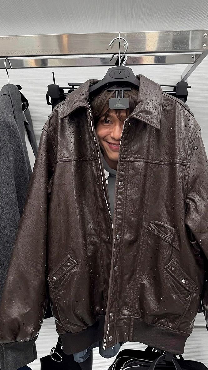 Throwing on a Distressed Leather Jacket with a Hoodie
