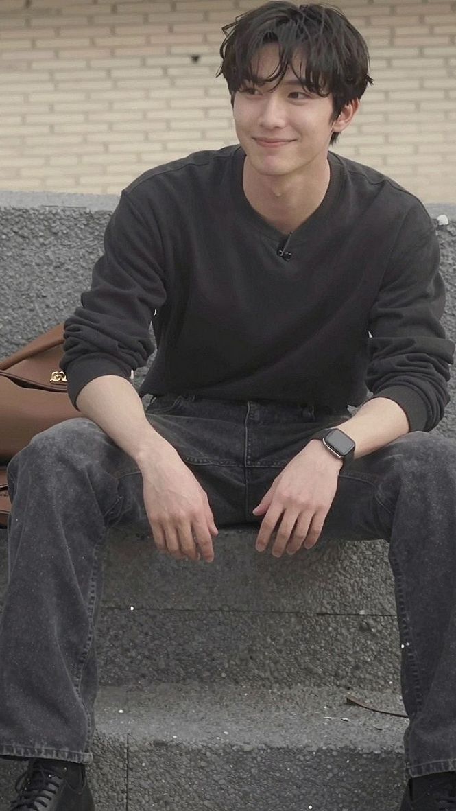 Layering an Oversized Leather Jacket with a Simple Crewneck